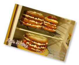 a full fridge of cakes